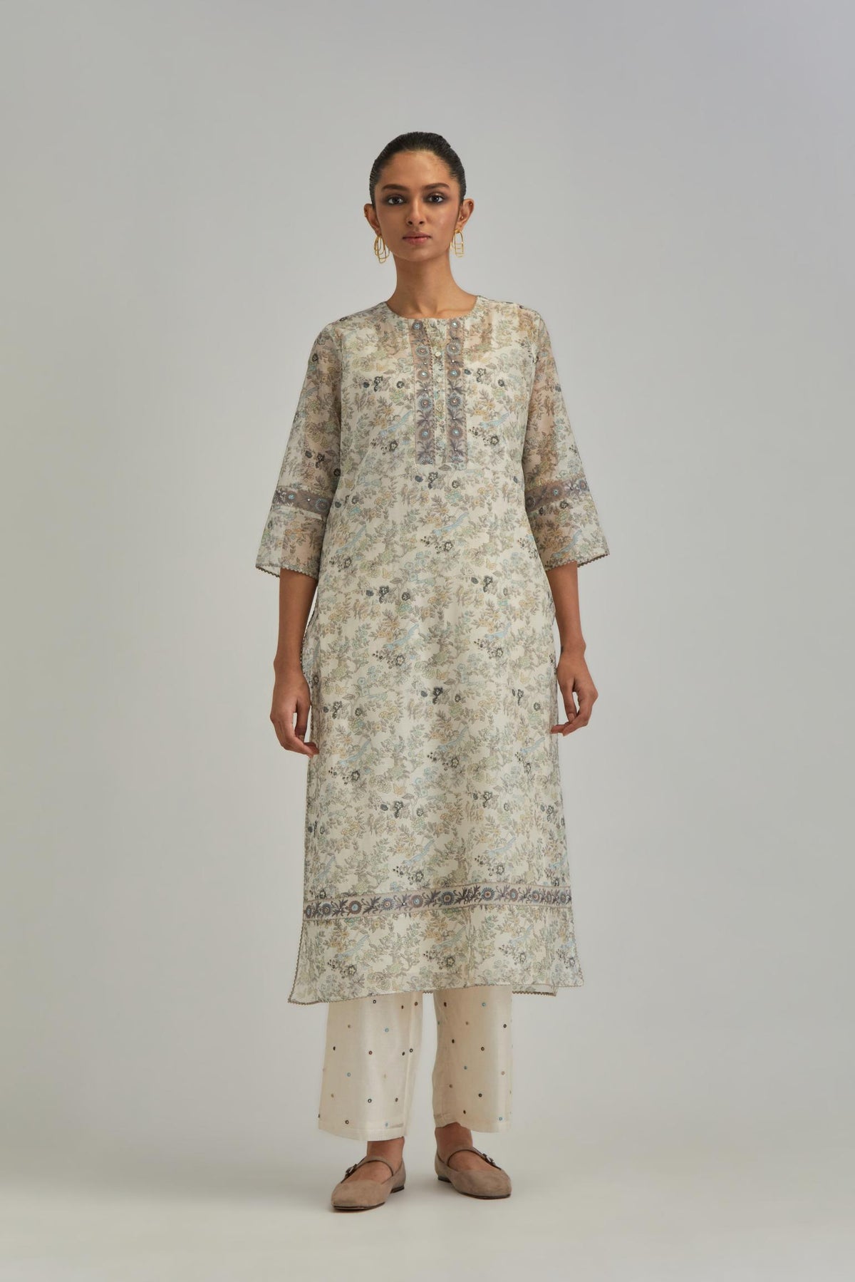 Silk Chanderi kurta set with all-over earthy coloured hand block print and embroidery at neck, kurta hem and sleeves.
