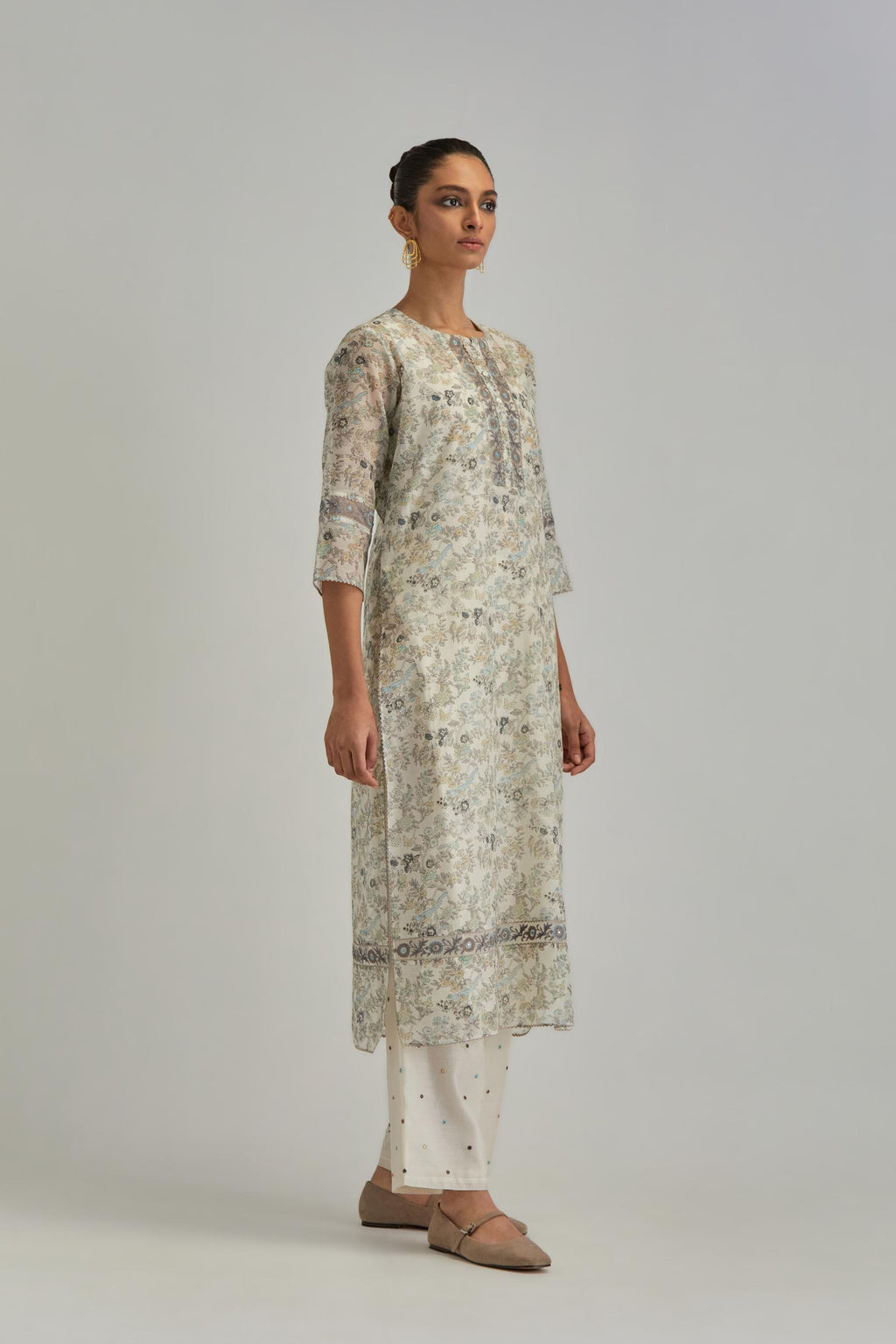 Silk Chanderi kurta set with all-over earthy coloured hand block print and embroidery at neck, kurta hem and sleeves.