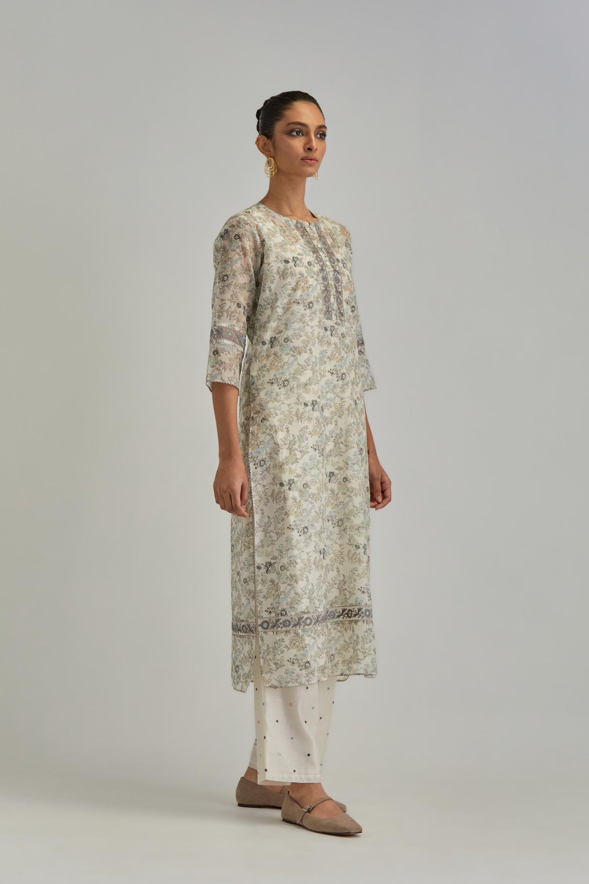 Silk Chanderi kurta set with all-over earthy coloured hand block print and embroidery at neck, kurta hem and sleeves.