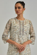 Silk Chanderi kurta set with all-over earthy coloured hand block print and embroidery at neck, kurta hem and sleeves.