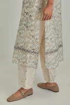 Silk Chanderi kurta set with all-over earthy coloured hand block print and embroidery at neck, kurta hem and sleeves.
