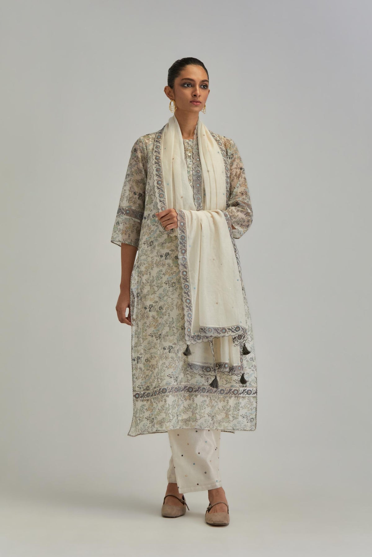 Silk Chanderi kurta set with all-over earthy coloured hand block print and embroidery at neck, kurta hem and sleeves.