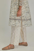 Silk Chanderi short kurta set with all-over earthy coloured hand block print and embroidery at kurta hem and sleeves.