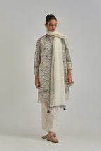 Silk Chanderi short kurta set with all-over earthy coloured hand block print and embroidery at kurta hem and sleeves.