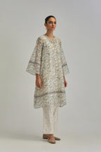 Silk Chanderi short A-line kurta set with all-over earthy coloured hand block print and embroidery at kurta hem and sleeves.