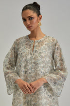 Silk Chanderi short A-line kurta set with all-over earthy coloured hand block print and embroidery at kurta hem and sleeves.