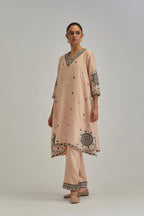 Pink silk Chanderi short V-neck kurta set, with straight hem and side pockets, decorated with fine appliqué and Aari thread embroidery.