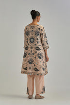 Pink short A-line silk Chanderi kurta set, fully embroidered with earthy coloured appliqué with Aari thread work and silk tassels.