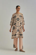 Pink short A-line silk Chanderi kurta set, fully embroidered with earthy coloured appliqué with Aari thread work and silk tassels.