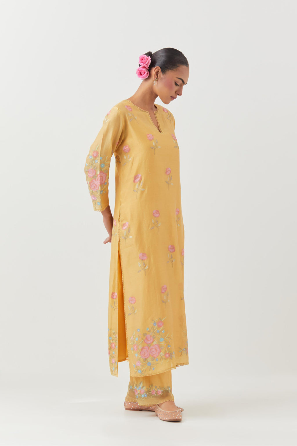 Yellow silk Chanderi straight kurta set with all-over roses embroidered in thread and scalloped organza detail at the edges.