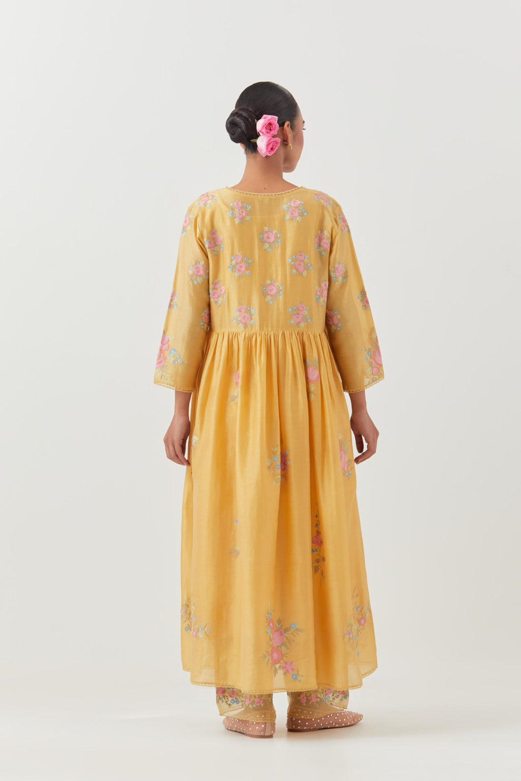 Yellow silk chanderi Kurta dress set with all-over assorted thread embroidery floral bunches.