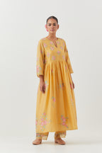 Yellow silk chanderi Kurta dress set with all-over assorted thread embroidery floral bunches.