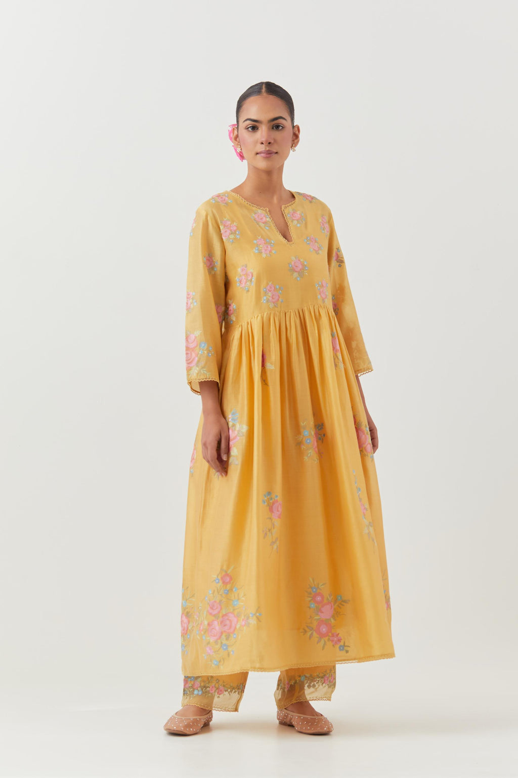 Yellow silk chanderi Kurta dress set with all-over assorted thread embroidery floral bunches.