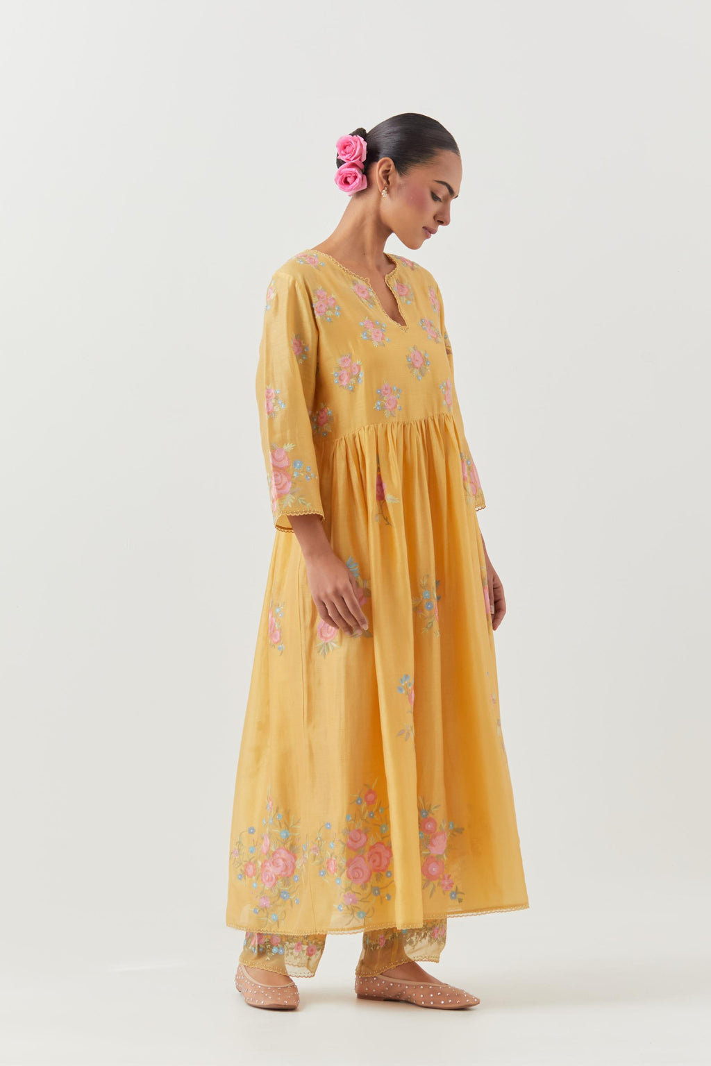 Yellow silk chanderi Kurta dress set with all-over assorted thread embroidery floral bunches.