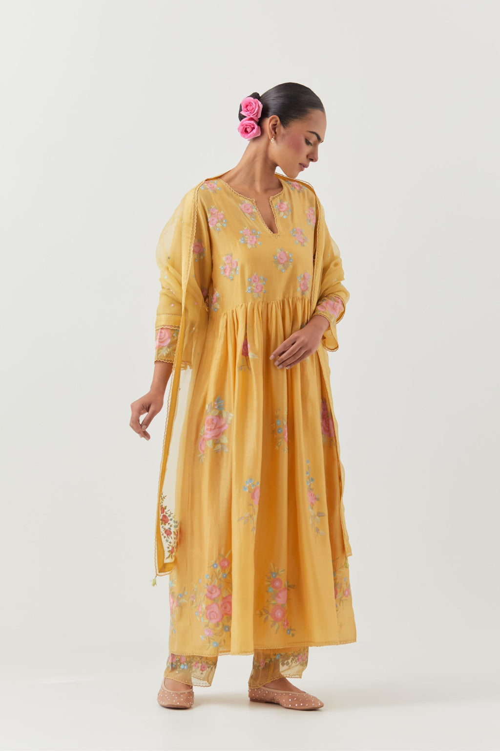 Yellow silk chanderi Kurta dress set with all-over assorted thread embroidery floral bunches.