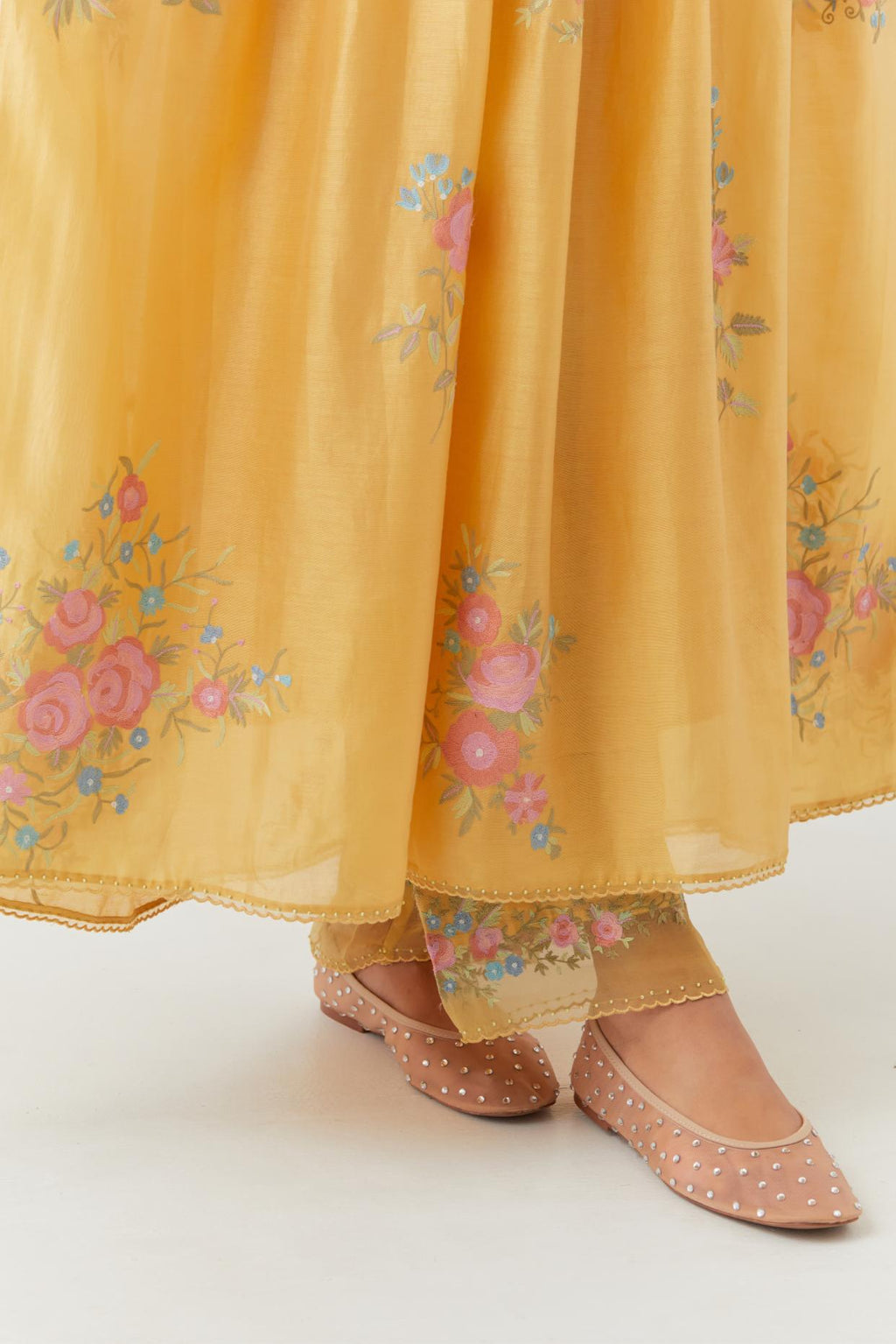 Yellow silk chanderi Kurta dress set with all-over assorted thread embroidery floral bunches.