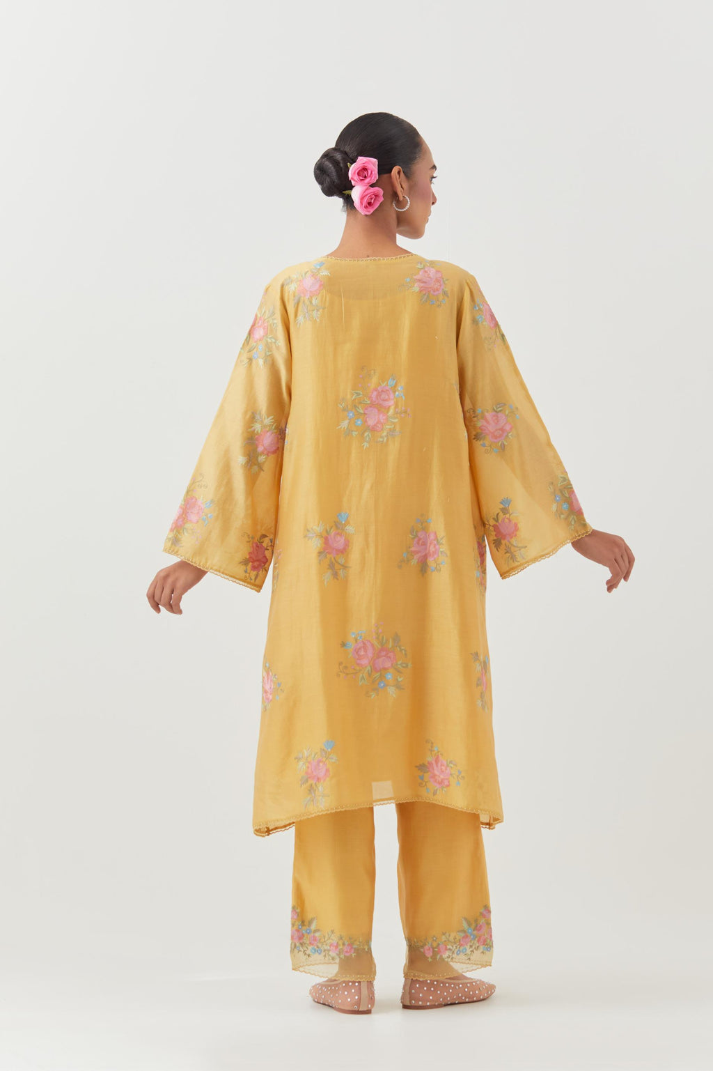 Yellow silk chanderi A-line short kurta set, with thread embroidery roses all over.