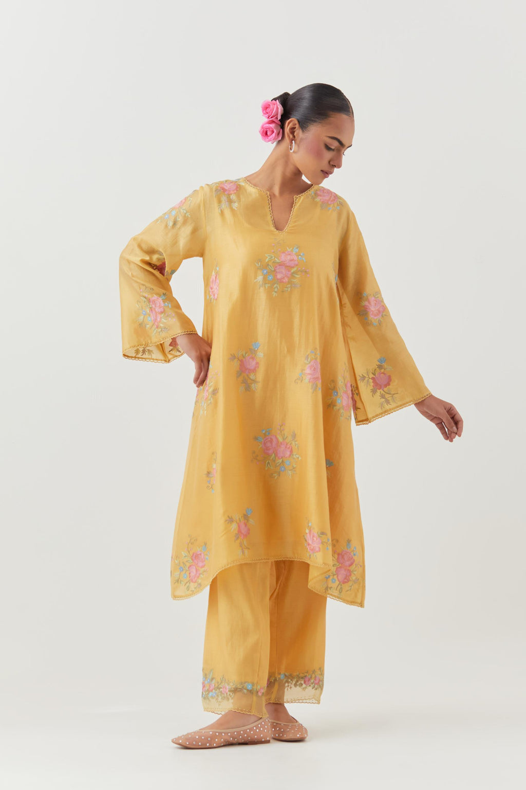 Yellow silk chanderi A-line short kurta set, with thread embroidery roses all over.