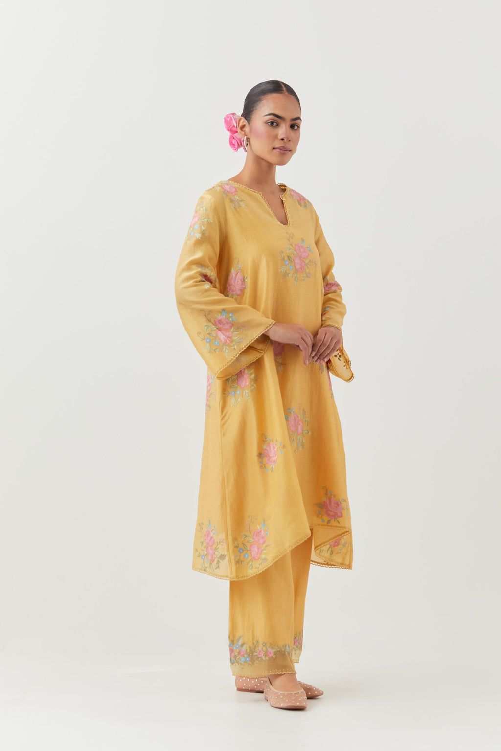 Yellow silk chanderi A-line short kurta set, with thread embroidery roses all over.