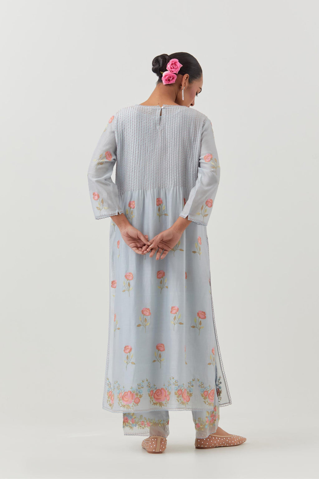 Blue silk chanderi kurta set with pin tucks at yoke and all-over rose flower embroidery.