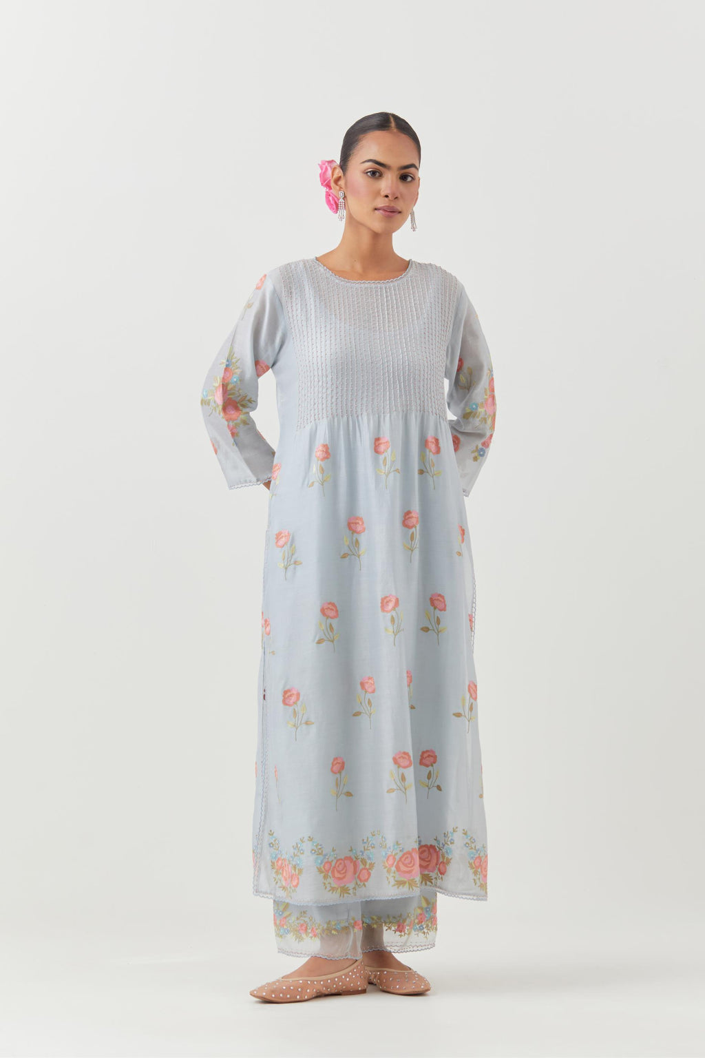 Blue silk chanderi kurta set with pin tucks at yoke and all-over rose flower embroidery.