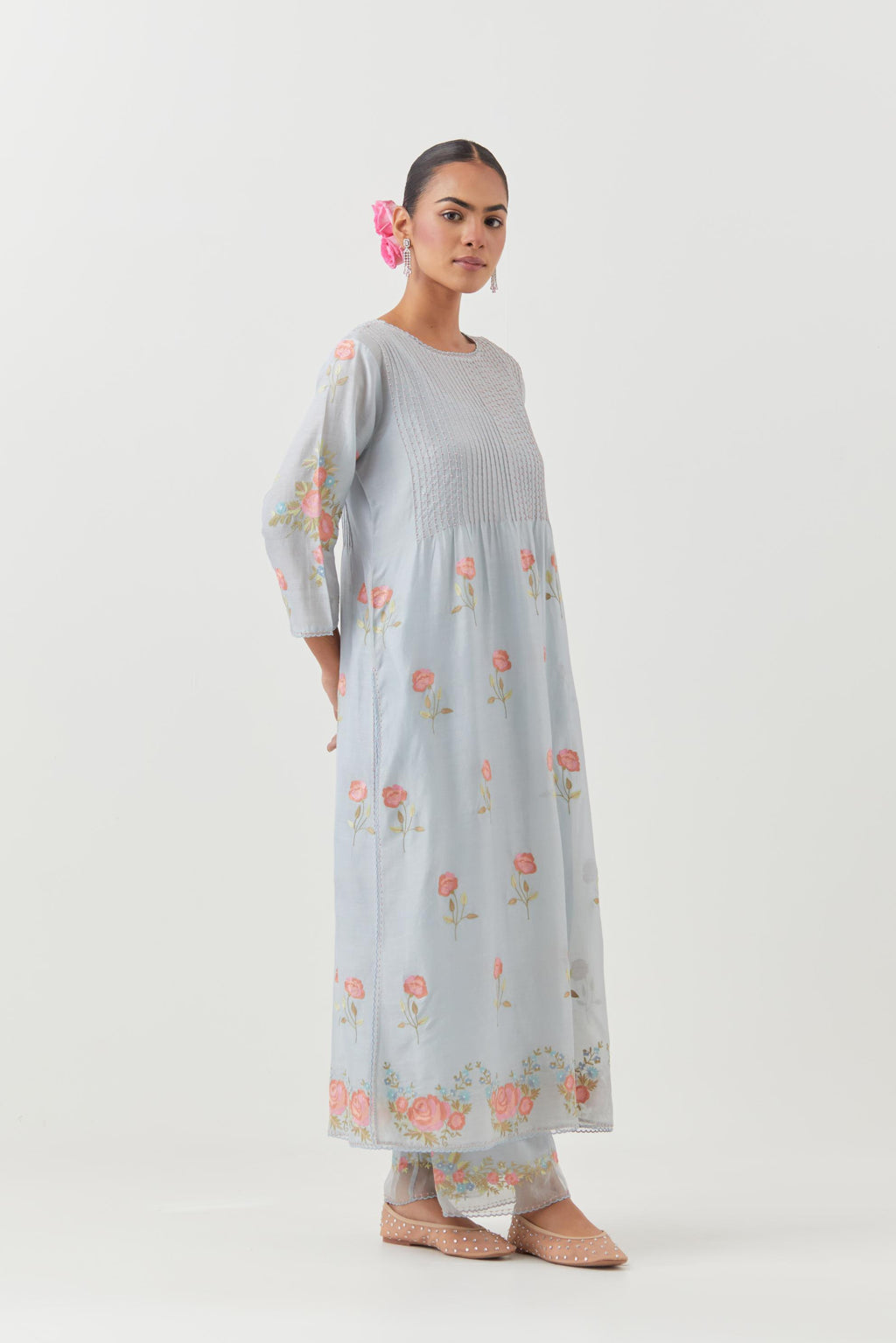 Blue silk chanderi kurta set with pin tucks at yoke and all-over rose flower embroidery.