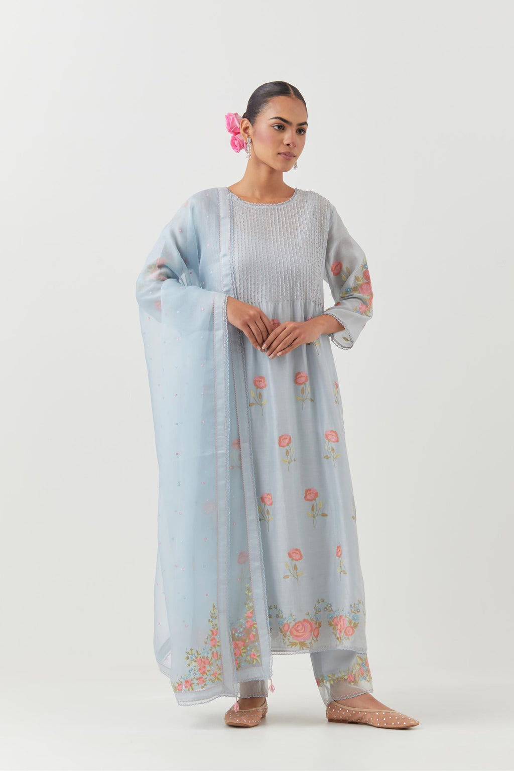 Blue silk chanderi kurta set with pin tucks at yoke and all-over rose flower embroidery.