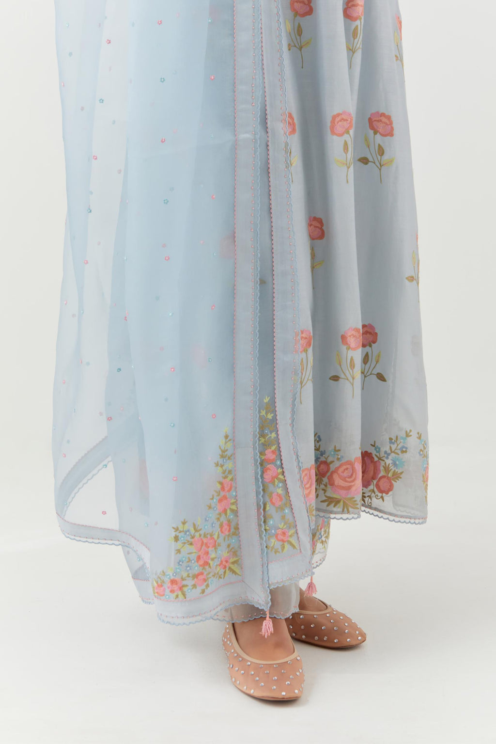 Blue silk Chanderi straight kurta set with all-over roses embroidered in thread and scalloped organza detail at the edges.