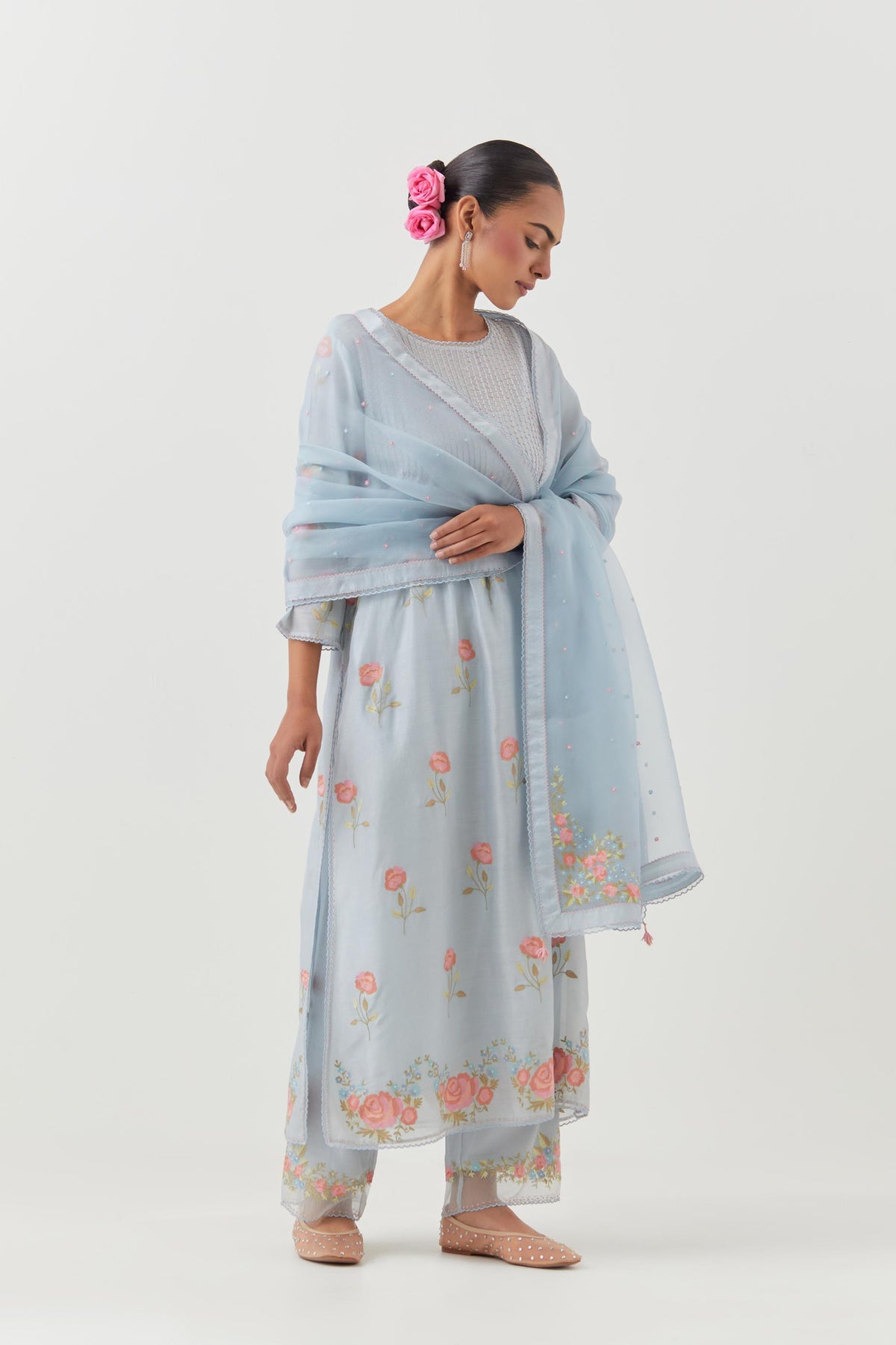 Blue silk chanderi kurta set with pin tucks at yoke and all-over rose flower embroidery.