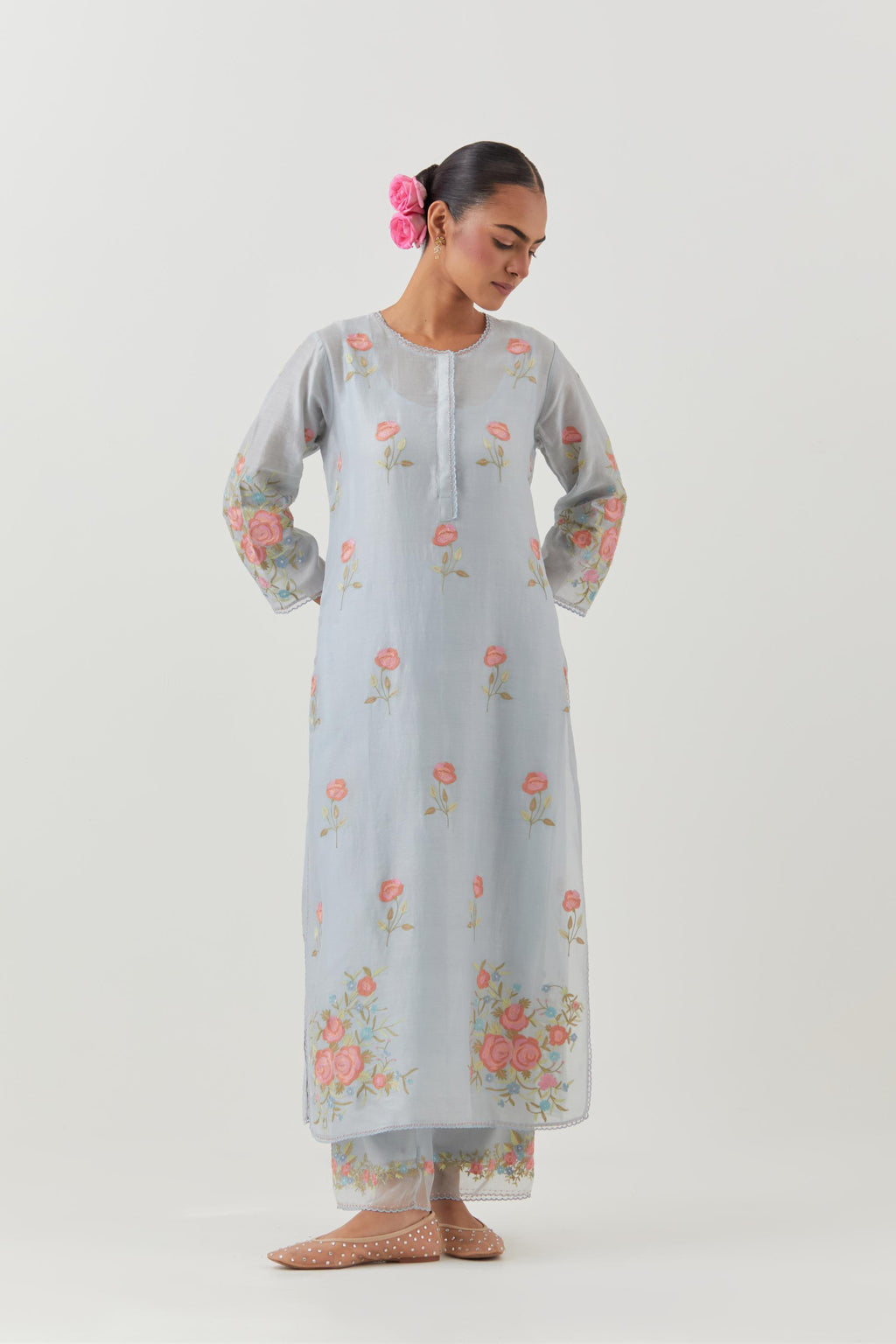 Blue silk Chanderi straight kurta set with all-over roses embroidered in thread and scalloped organza detail at the edges.