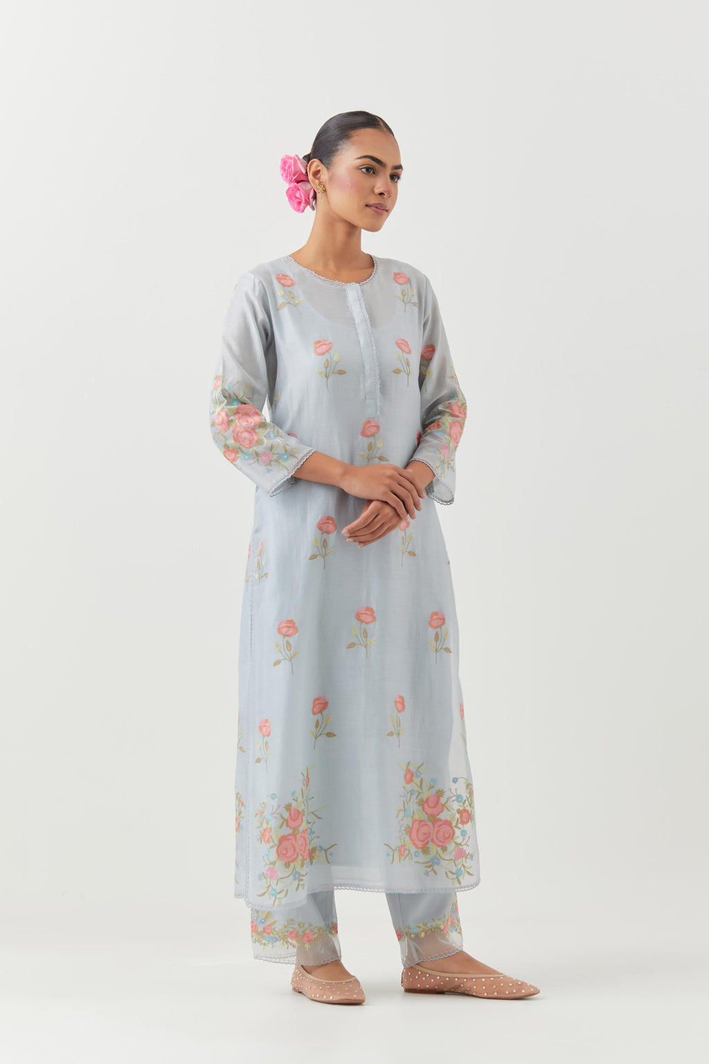 Blue silk Chanderi straight kurta set with all-over roses embroidered in thread and scalloped organza detail at the edges.