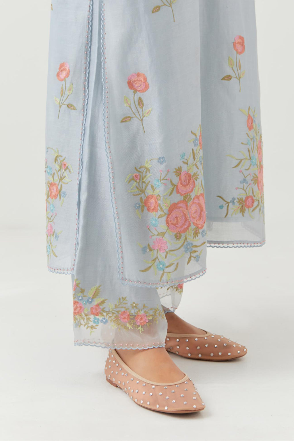 Blue silk Chanderi straight kurta set with all-over roses embroidered in thread and scalloped organza detail at the edges.