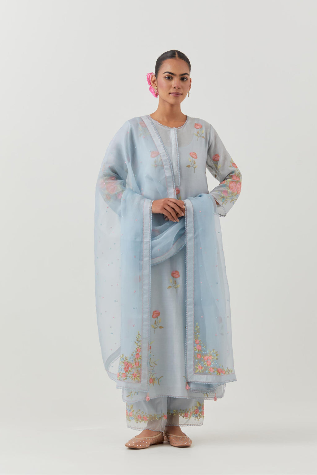 Blue silk Chanderi straight kurta set with all-over roses embroidered in thread and scalloped organza detail at the edges.