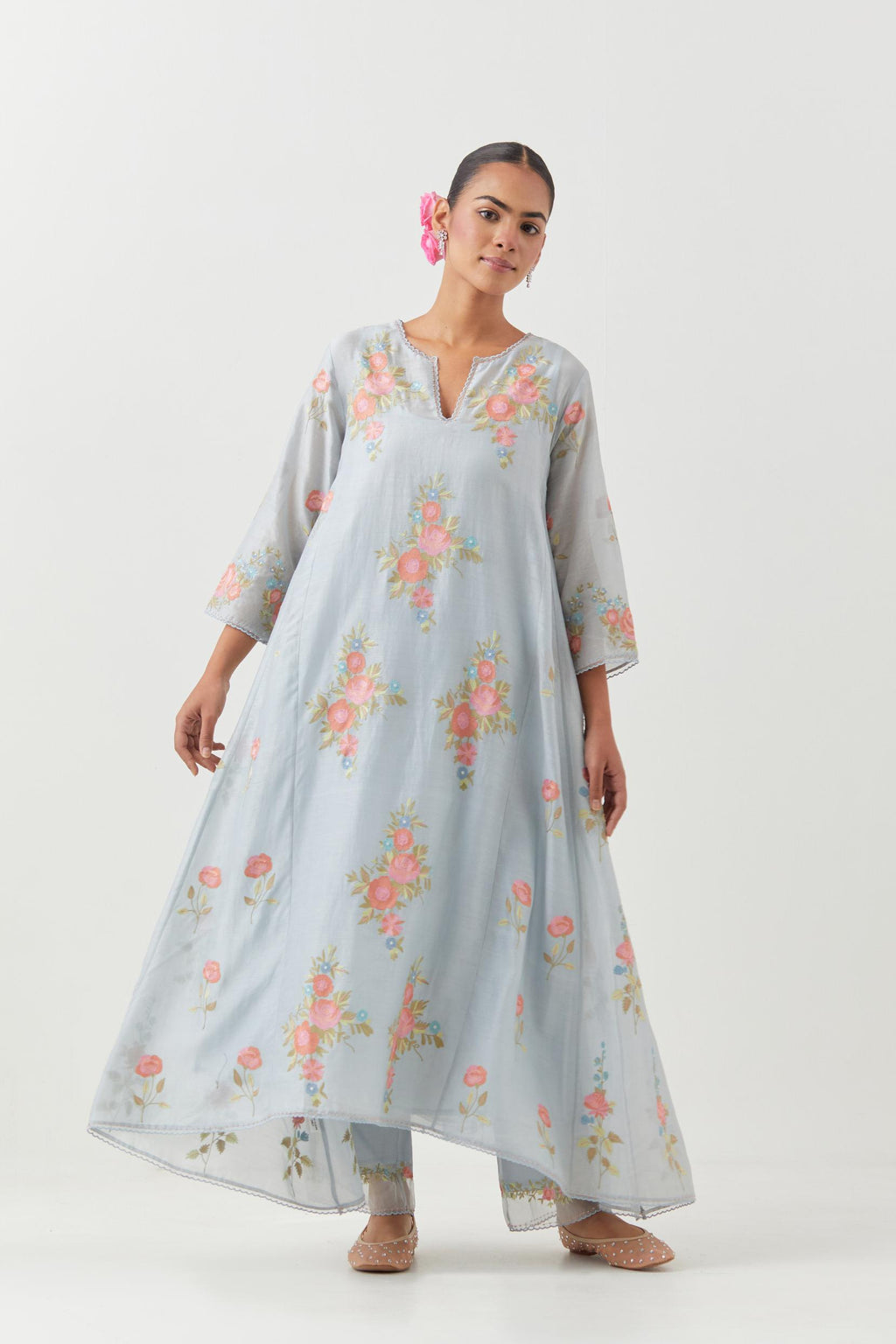 Blue silk chanderi easy fit, asymmetric hem, paneled kurta set with all-over thread embroidered roses, highlighted with scalloped organza at the edges with contrast beads.