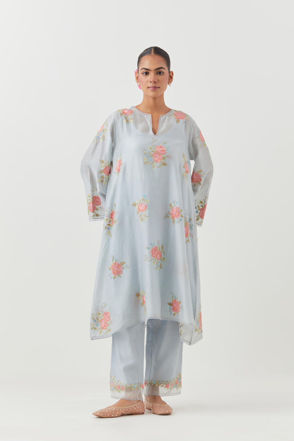 Blue silk chanderi A-line short kurta set, with thread embroidery roses all over.