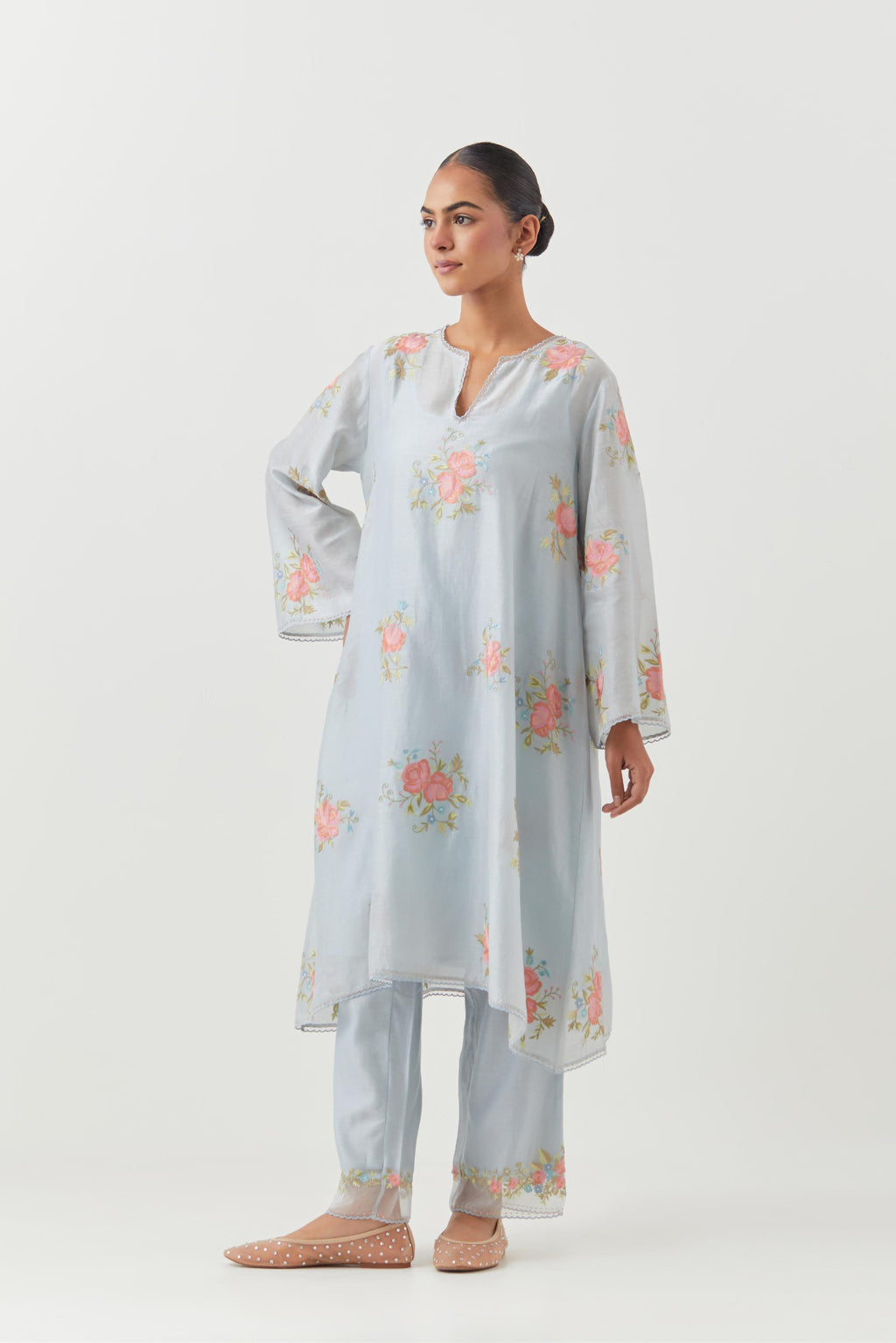 Blue silk chanderi A-line short kurta set, with thread embroidery roses all over.