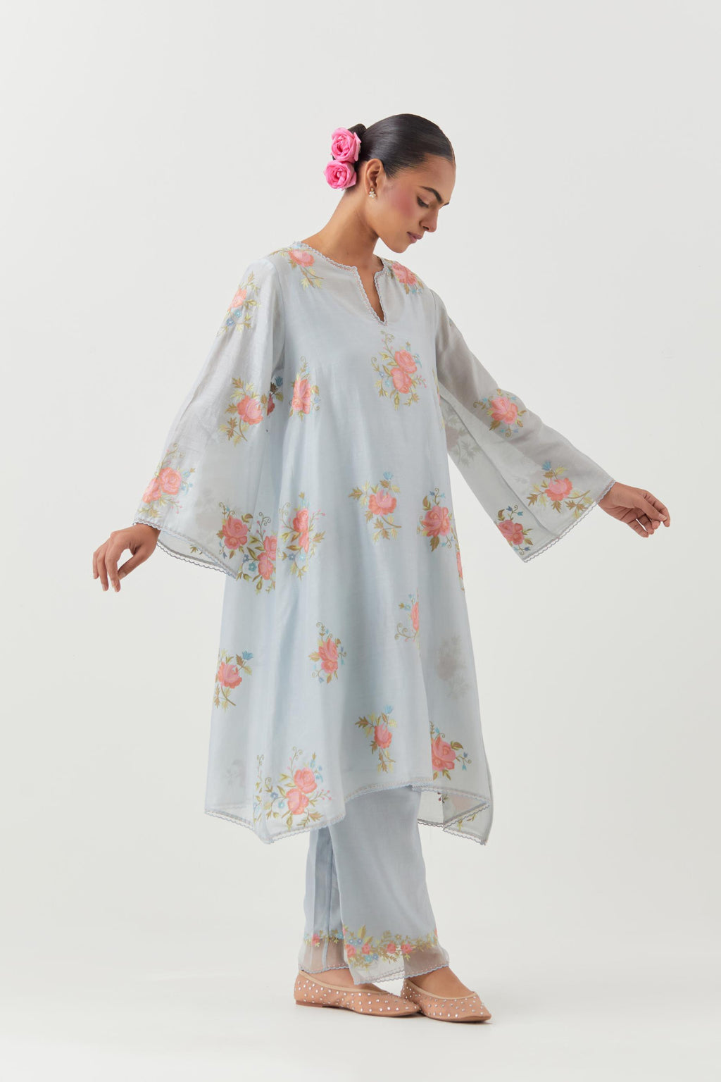 Blue silk chanderi A-line short kurta set, with thread embroidery roses all over.