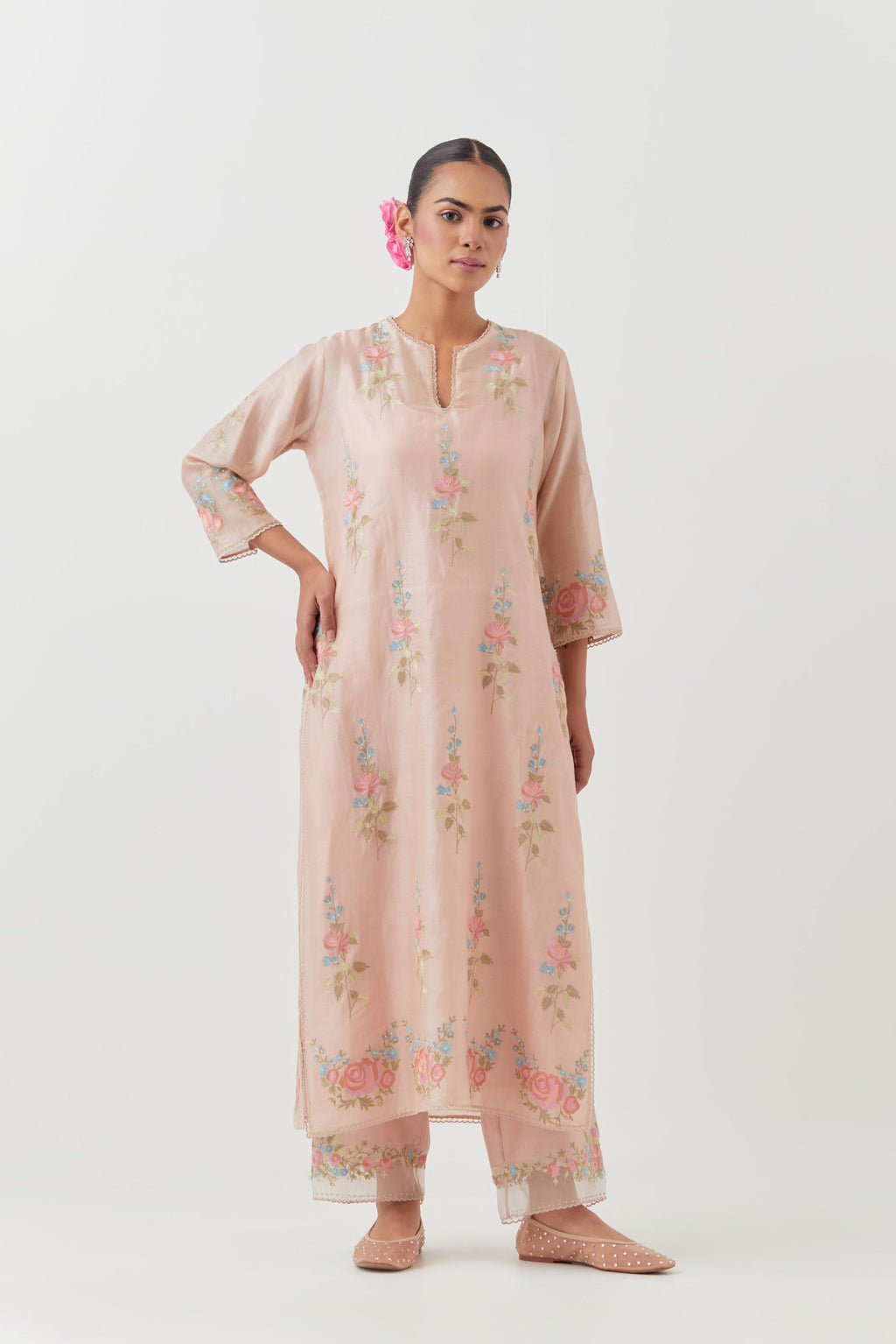 Pink silk Chanderi straight kurta set with all-over rose embroidery and scalloped organza detail at the edges.