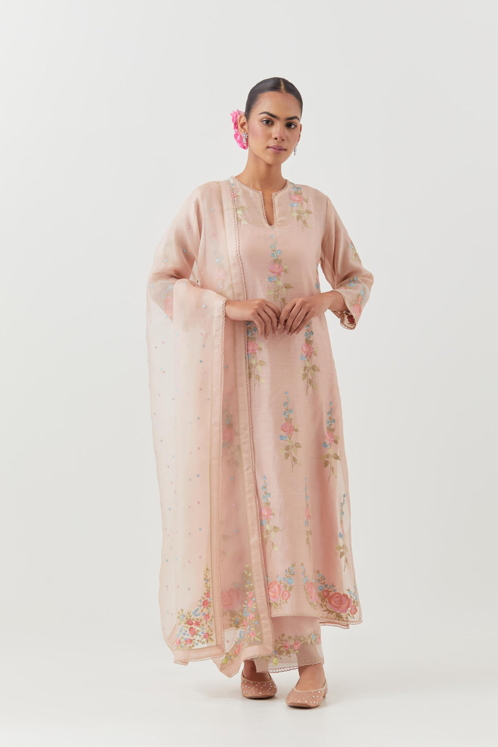 Pink silk Chanderi straight kurta set with all-over rose embroidery and scalloped organza detail at the edges.