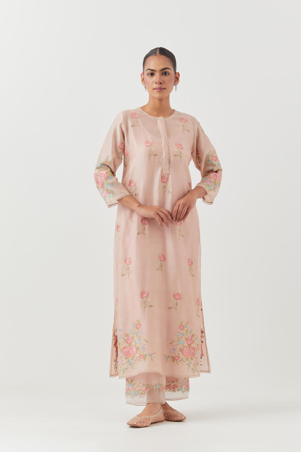 Pink silk Chanderi straight kurta set with all-over roses embroidered in thread and scalloped organza detail at the edges.