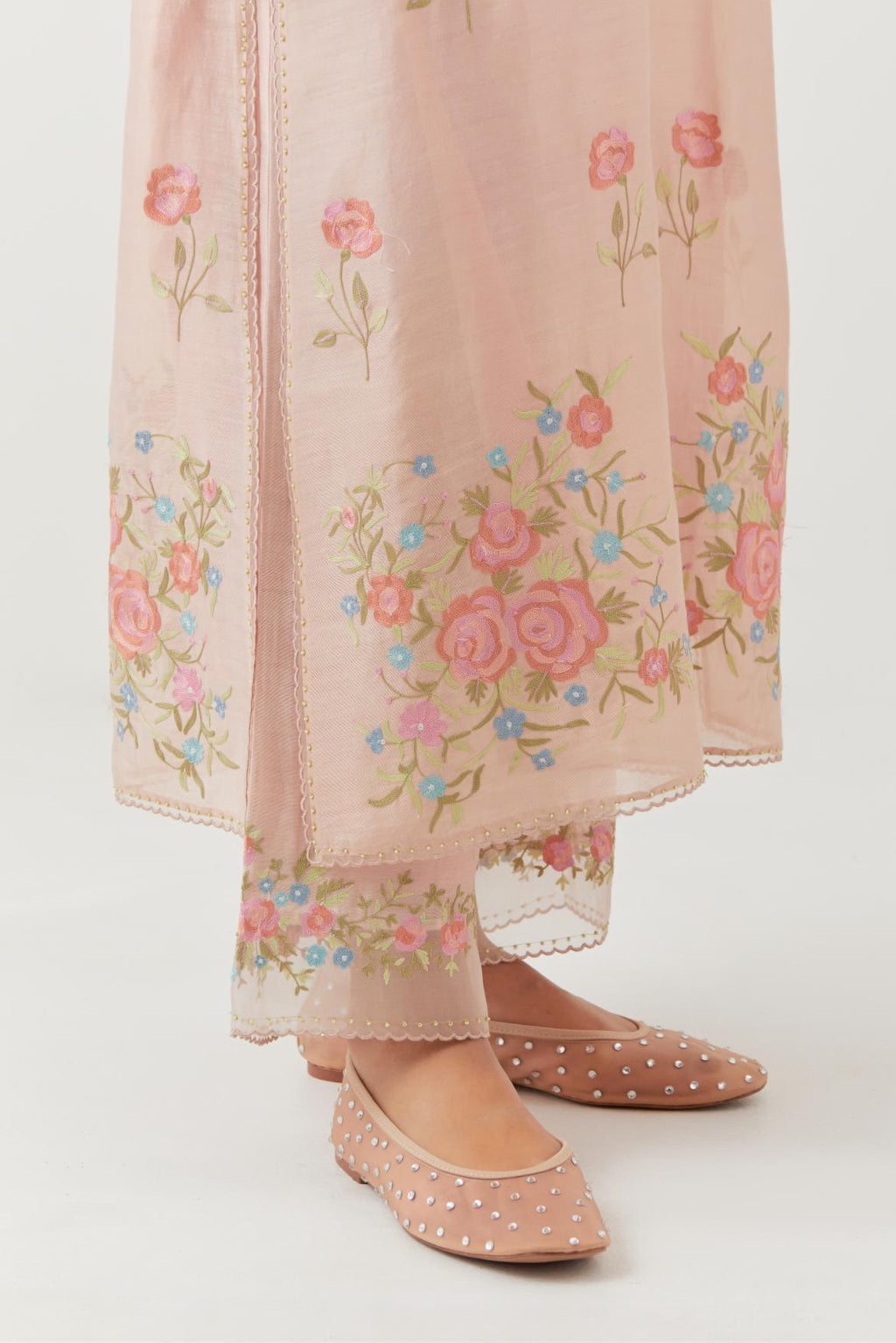 Pink silk Chanderi straight kurta set with all-over roses embroidered in thread and scalloped organza detail at the edges.