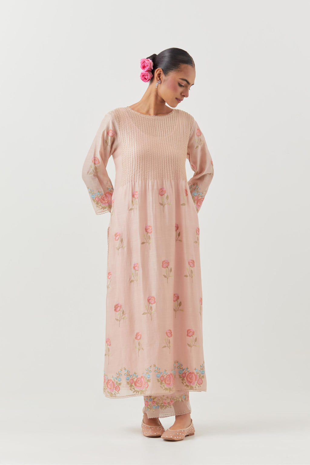 Pink silk chanderi kurta set with pin tucks at yoke and all-over rose flower embroidery.