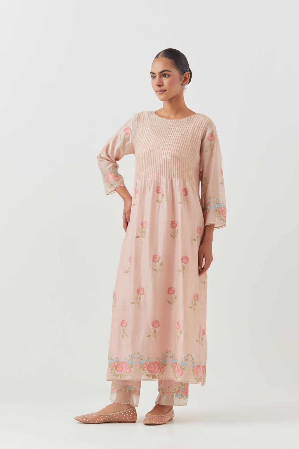 Pink silk chanderi kurta set with pin tucks at yoke and all-over rose flower embroidery.