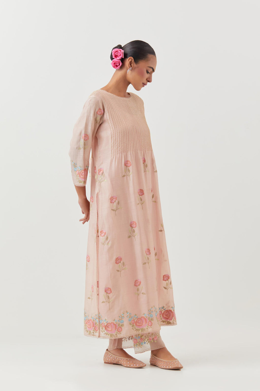 Pink silk chanderi kurta set with pin tucks at yoke and all-over rose flower embroidery.