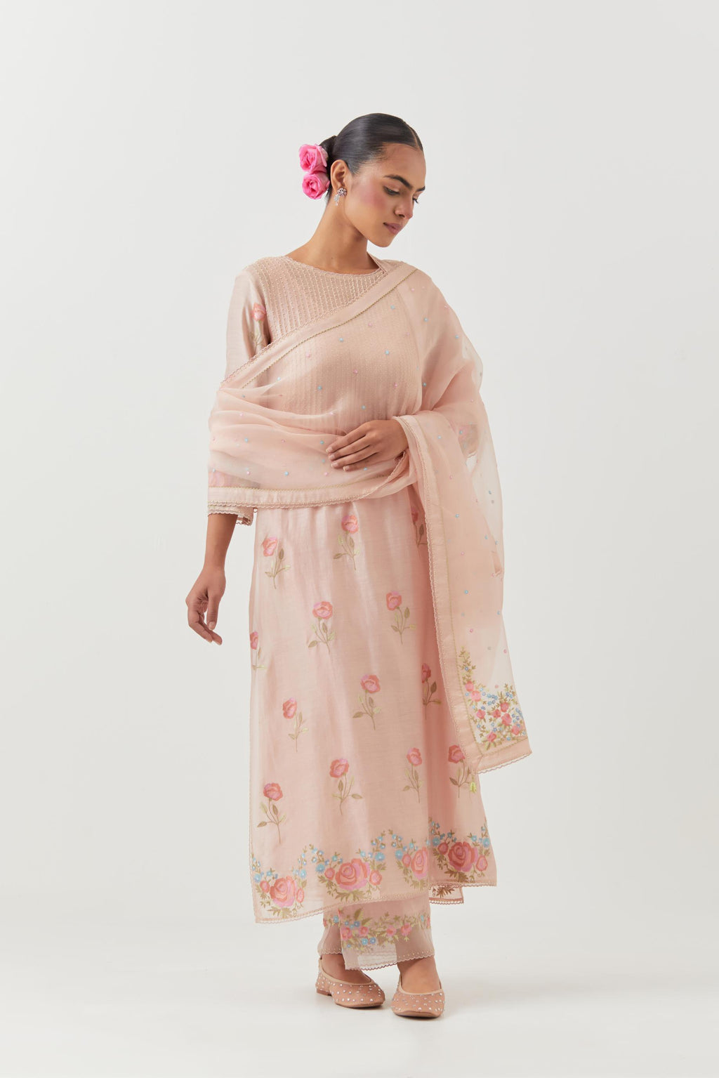 Pink silk chanderi kurta set with pin tucks at yoke and all-over rose flower embroidery.