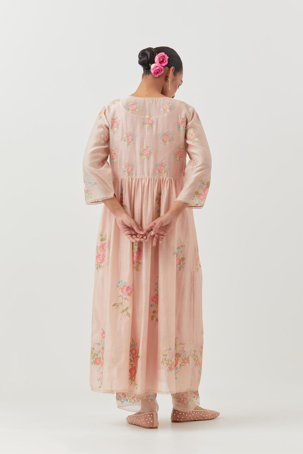 Pink silk chanderi Kurta dress set with all-over assorted thread embroidery floral bunches.
