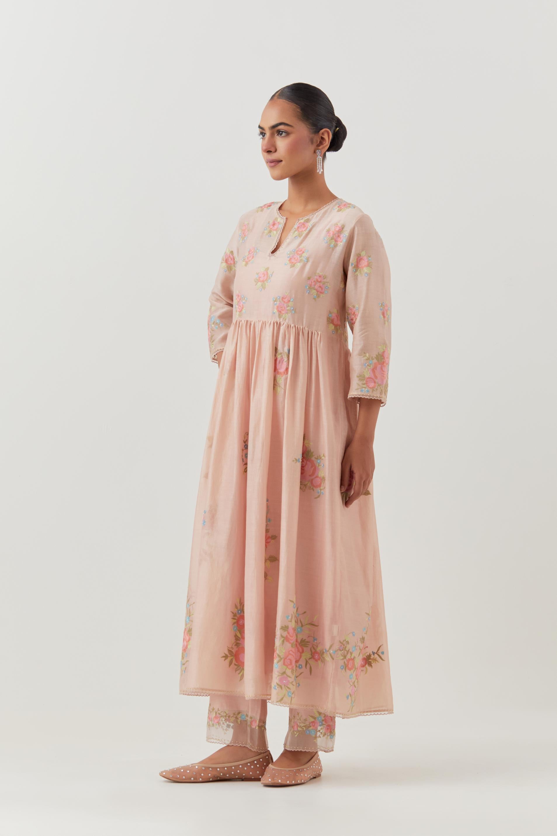 Pink silk chanderi Kurta dress set with all-over assorted thread embroidery floral bunches.