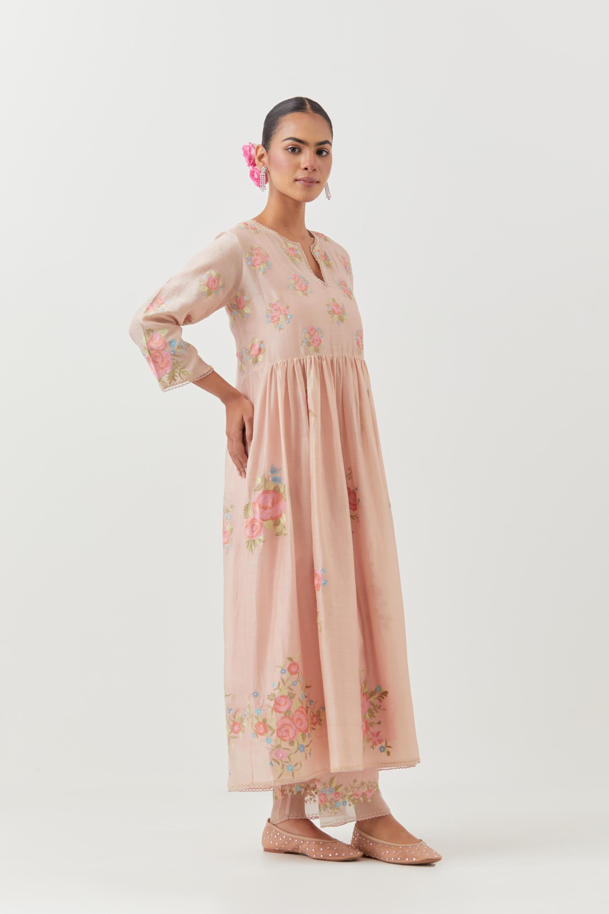 Pink silk chanderi Kurta dress set with all-over assorted thread embroidery floral bunches.