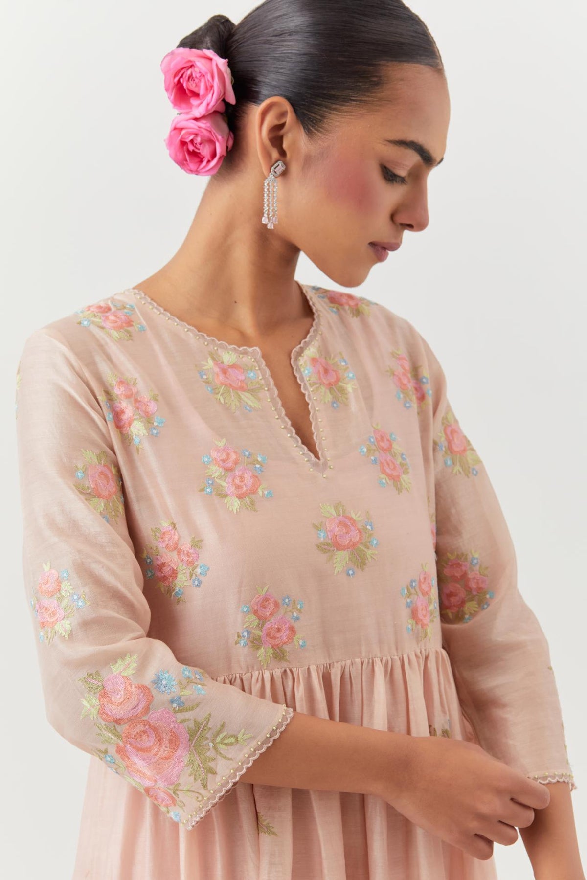 Pink silk chanderi Kurta dress set with all-over assorted thread embroidery floral bunches.