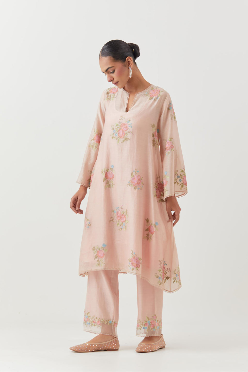 Pink silk chanderi A-line short kurta set, with thread embroidery roses all over.